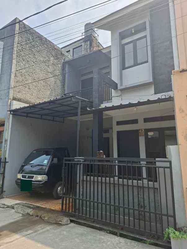 dijual rumah kelapa tiga