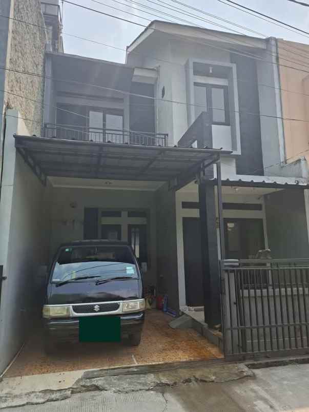 dijual rumah kelapa tiga