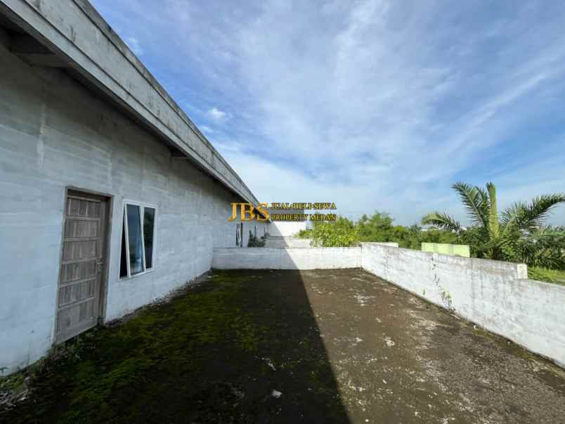 dijual rumah komplek graha metropolitan