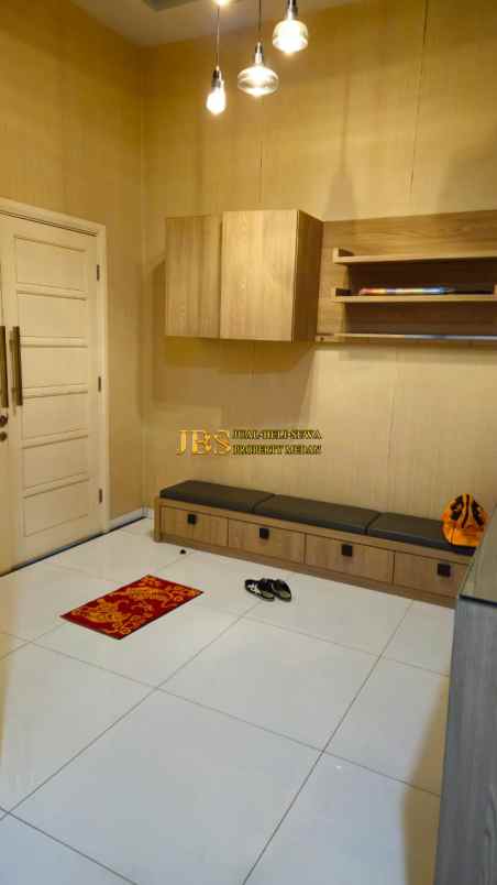 dijual rumah komplek graha metropolitan