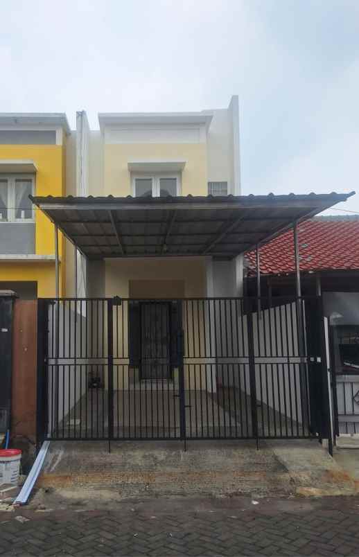 dijual rumah minimalis siap huni di puri gardena
