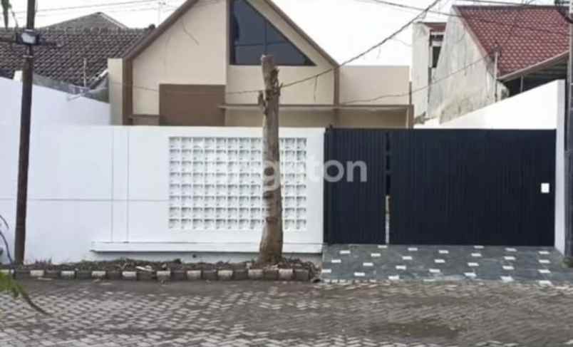 dijual rumah raya wiguna selatan