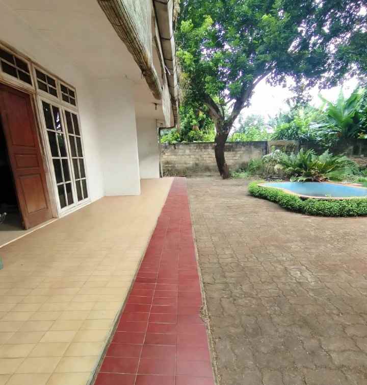 dijual rumah sisi jalan raya