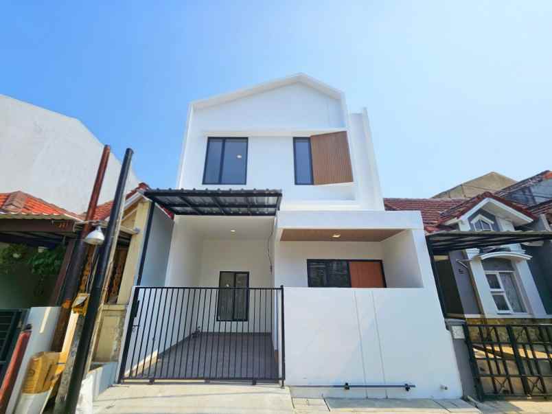 dijual rumah taman harapan baru