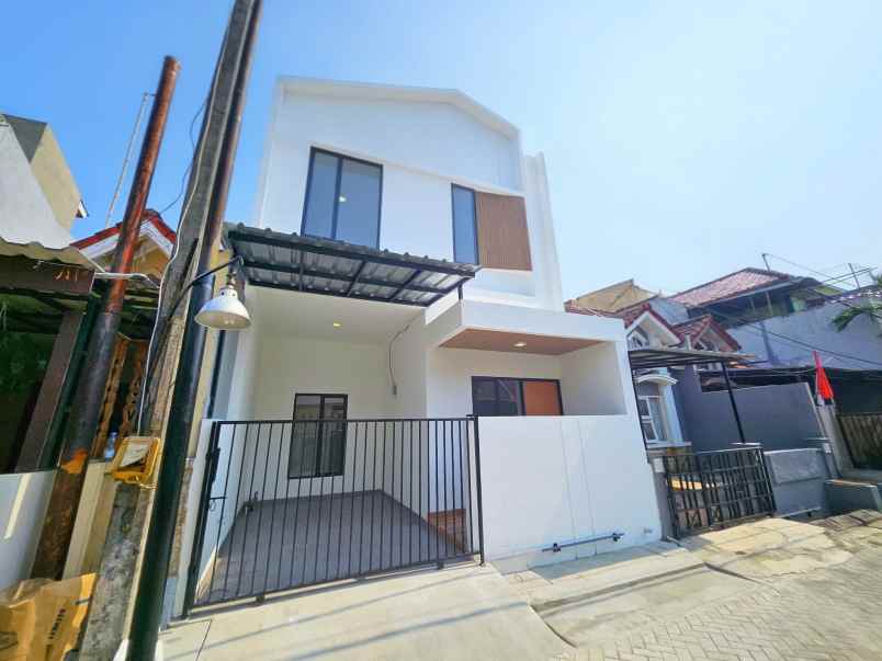 dijual rumah taman harapan baru