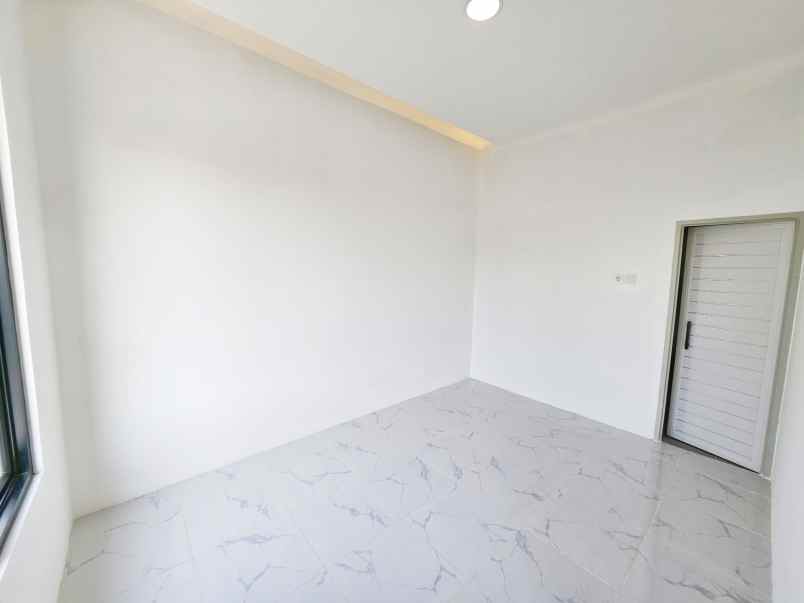 dijual rumah taman harapan baru