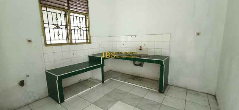 disewakan rumah komplek cemara hijau jalan