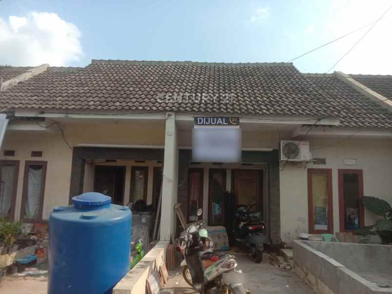 jual rumah di perumahan puri hijau regency