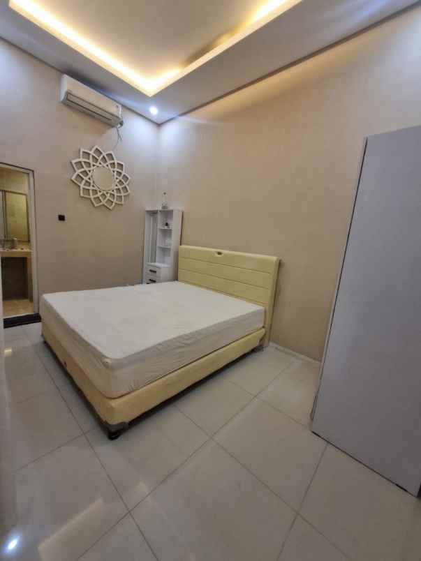 rumah 1man di pakuwon city puri asri sby