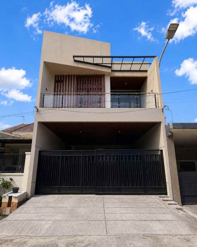 rumah babatan pantai new minimalis carport 2
