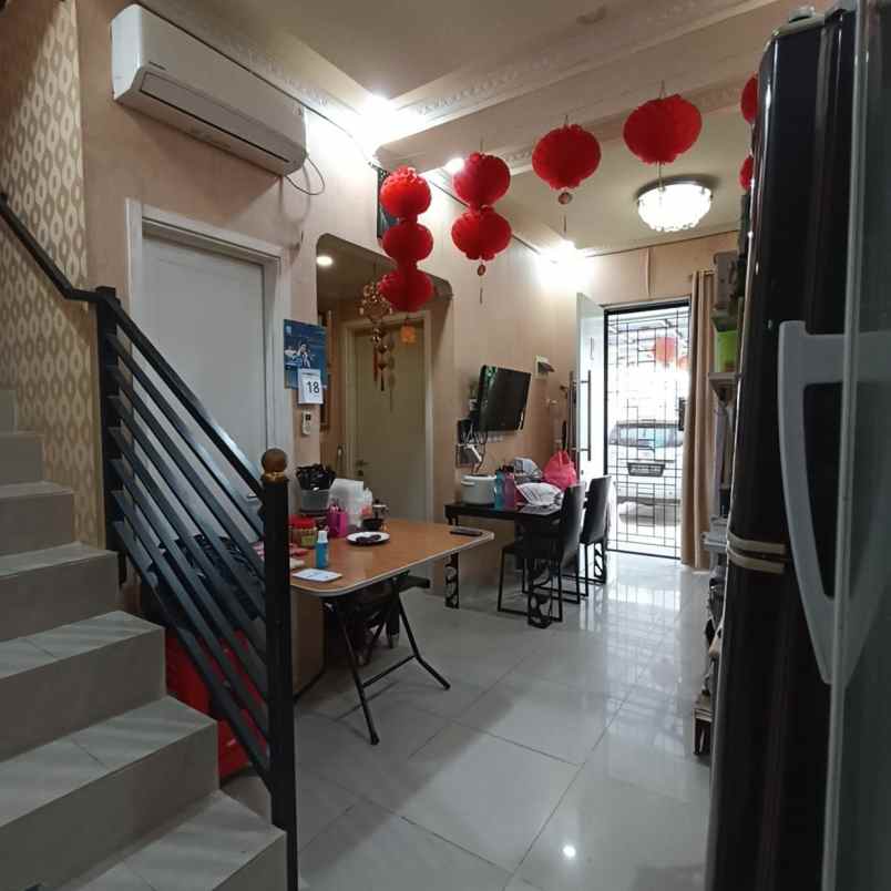 rumah jl river garden boulevard