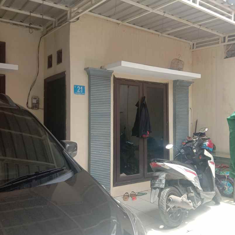 rumah jl taman wiguna selatan