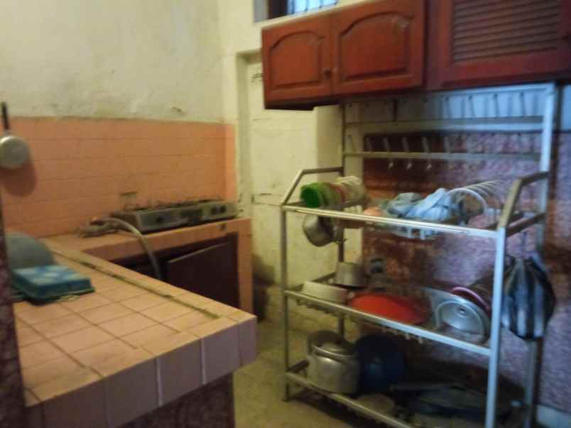 rumah lebar dekat lapangan rampal dijual cepat