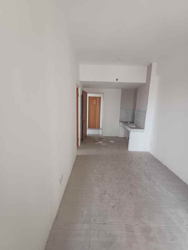 apartemen puncak dharmahusada tower b