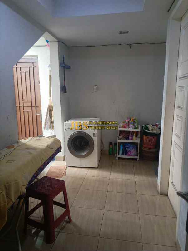 dijual rumah jalan bunga tanjung xi