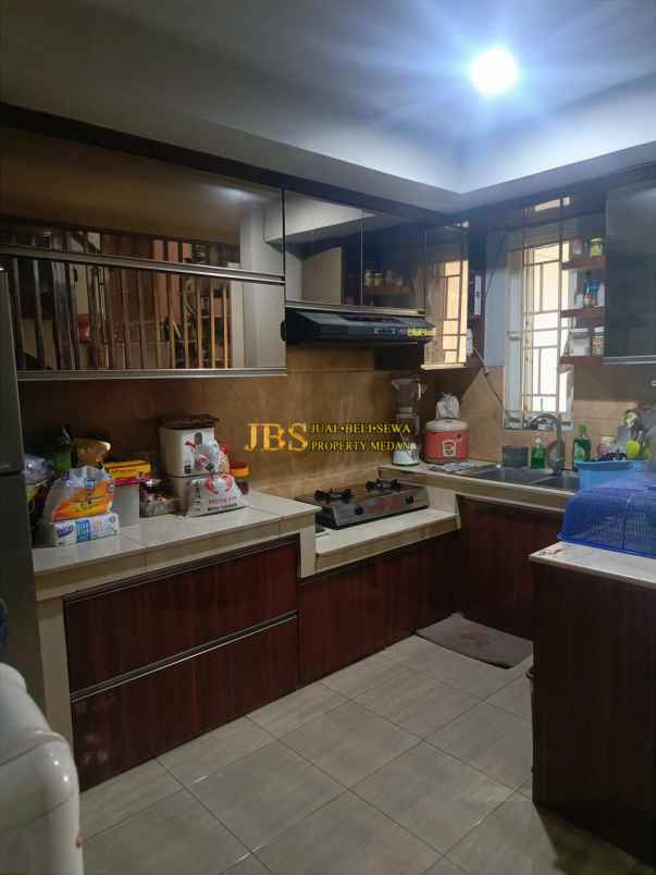 dijual rumah jalan bunga tanjung xi