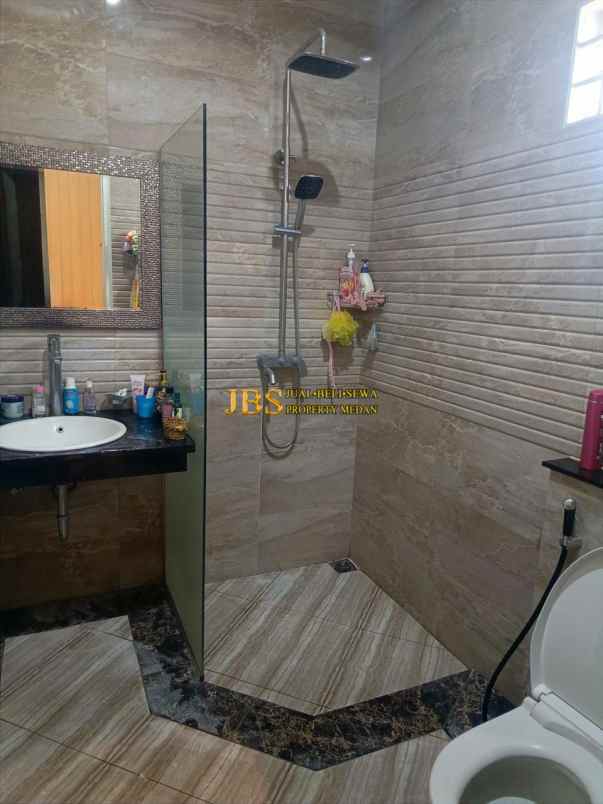 dijual rumah jalan bunga tanjung xi