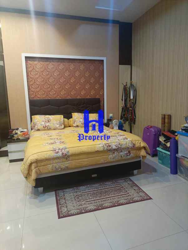 dijual rumah jalan bunga tanjung xi