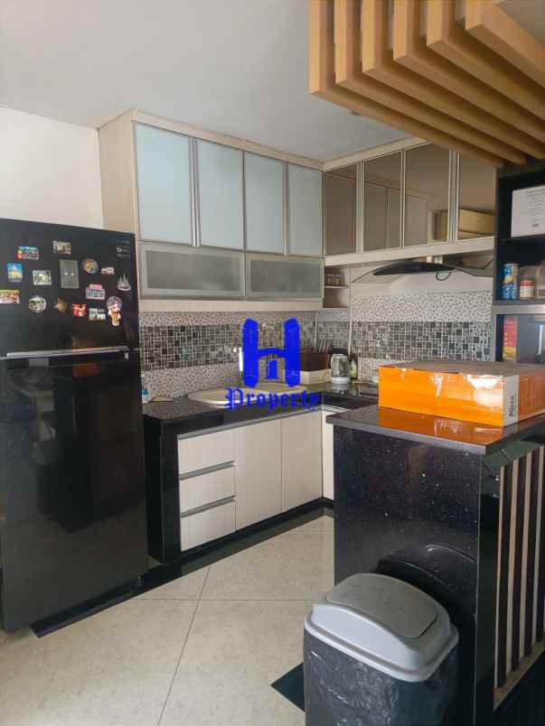 dijual rumah jalan bunga tanjung xi