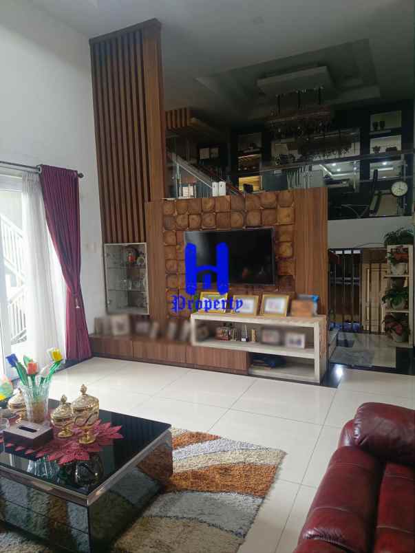 dijual rumah jalan bunga tanjung xi