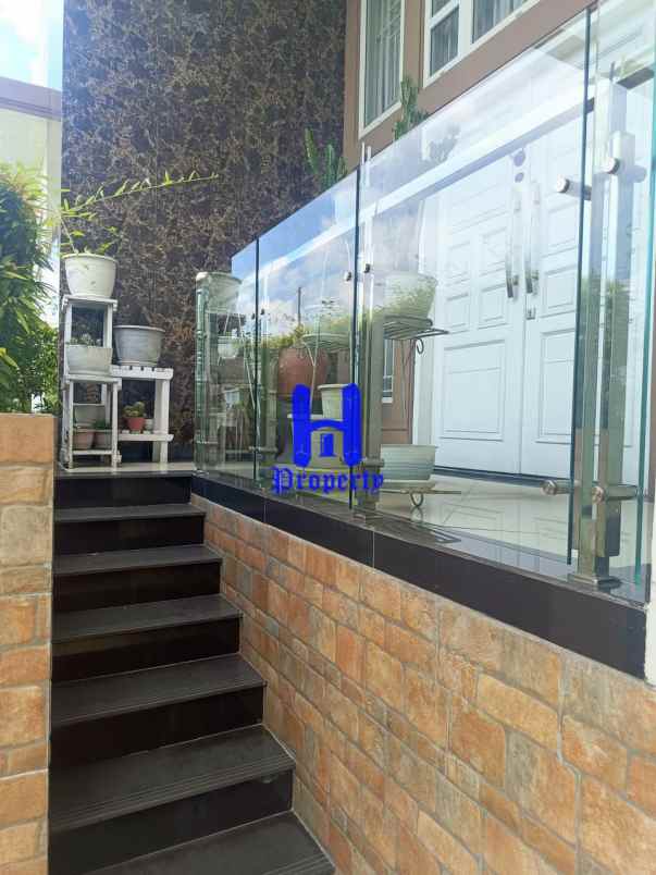 dijual rumah jalan bunga tanjung xi