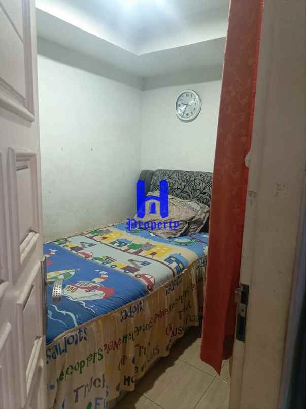 dijual rumah jalan bunga tanjung xi