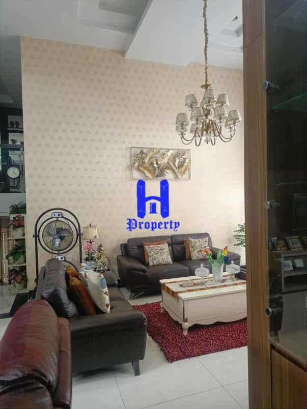 dijual rumah jalan bunga tanjung xi