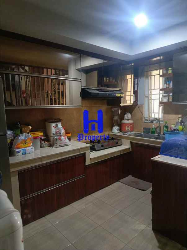 dijual rumah jalan bunga tanjung xi