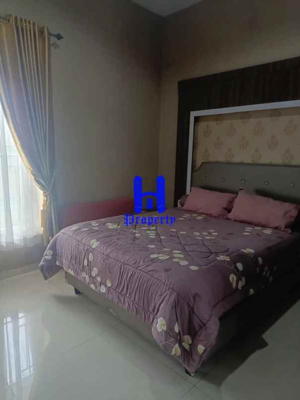 dijual rumah jalan bunga tanjung xi