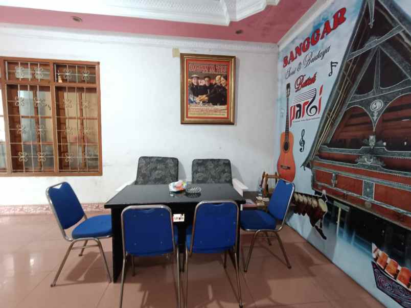 dijual rumah kayu putih