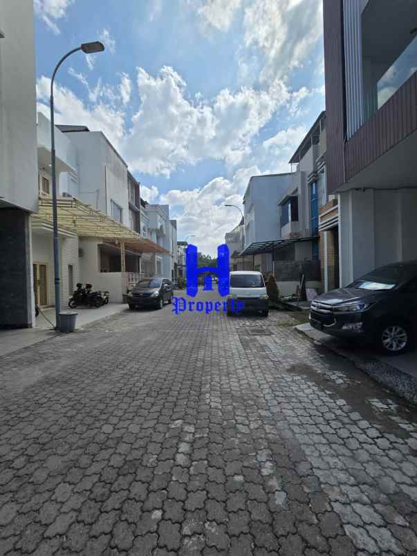 dijual rumah komplek grand cemara asri