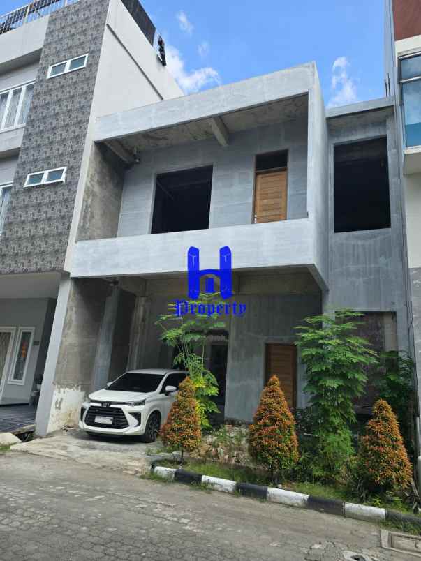 dijual rumah komplek grand cemara asri
