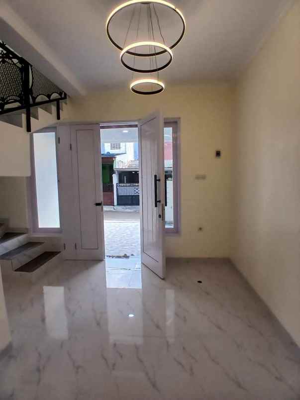 dijual rumah perumnas beji