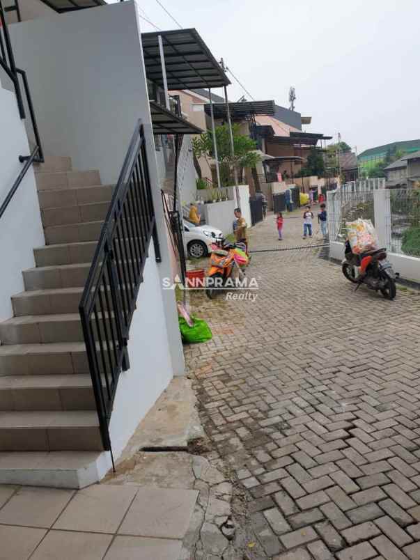 dijual rumah shm dalam cluster di beji depok siap huni