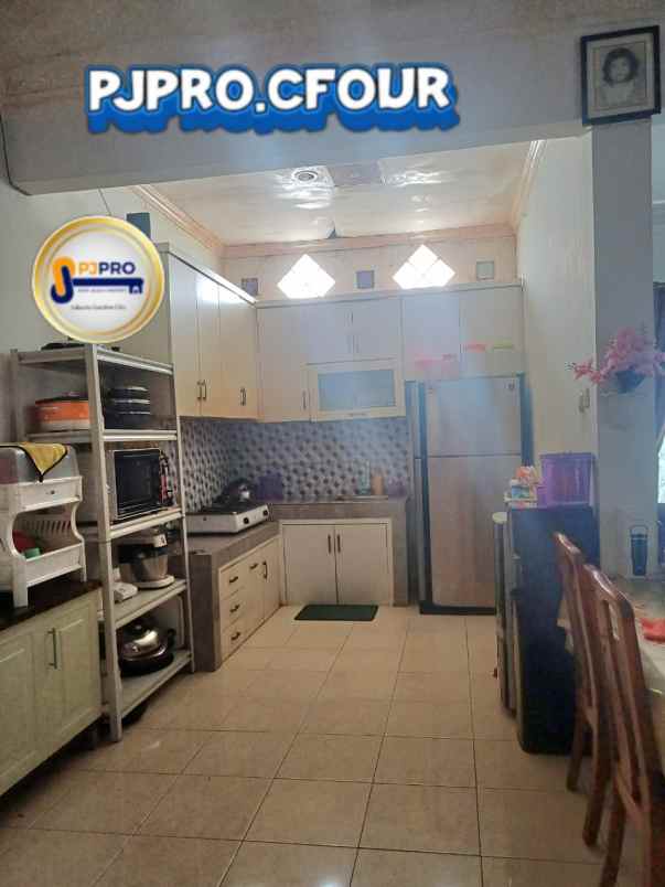 dijual rumah taman harapan baru