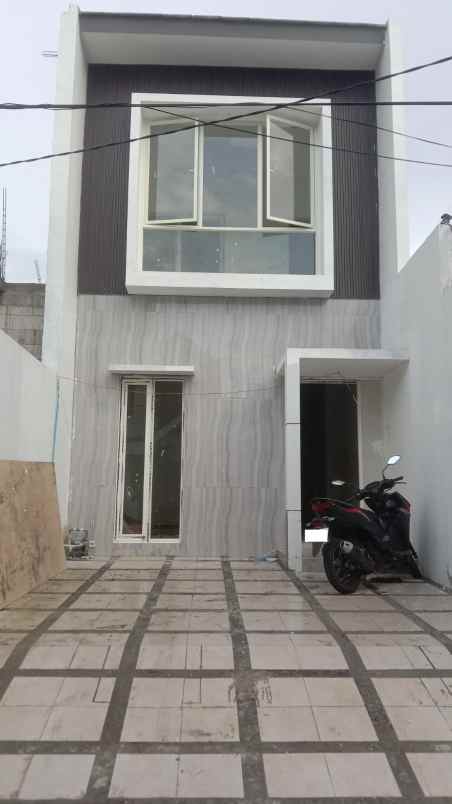 dijual rumah wiguna