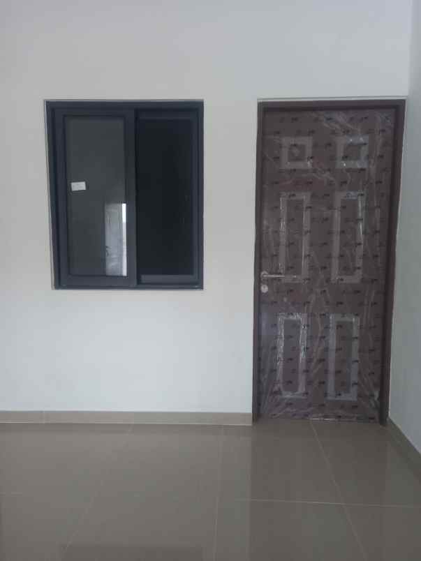 dijual rumah wiguna