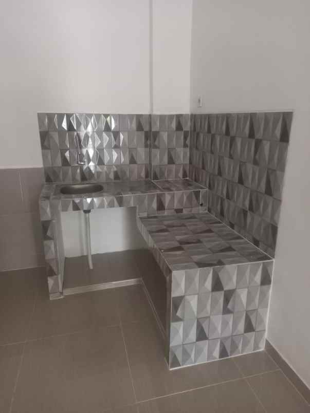 dijual rumah wiguna