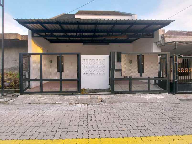 dijual rumah wiguna