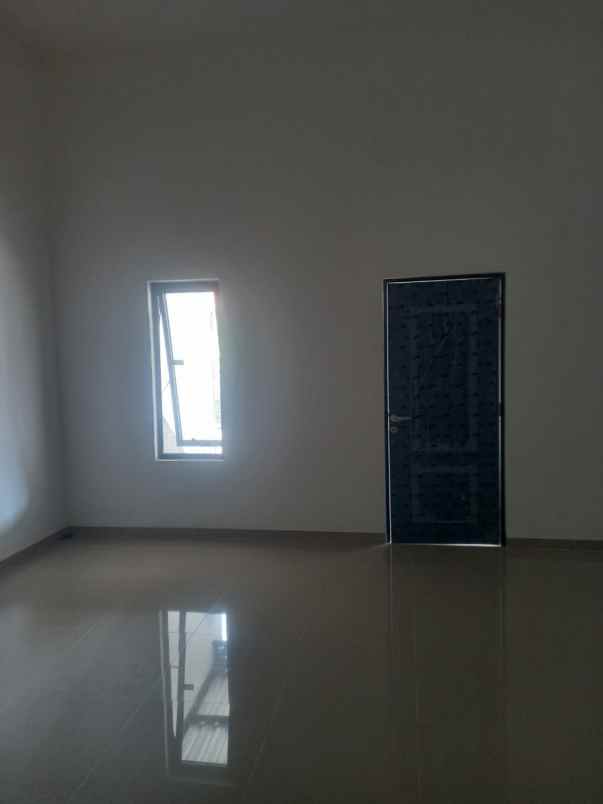 dijual rumah wiguna
