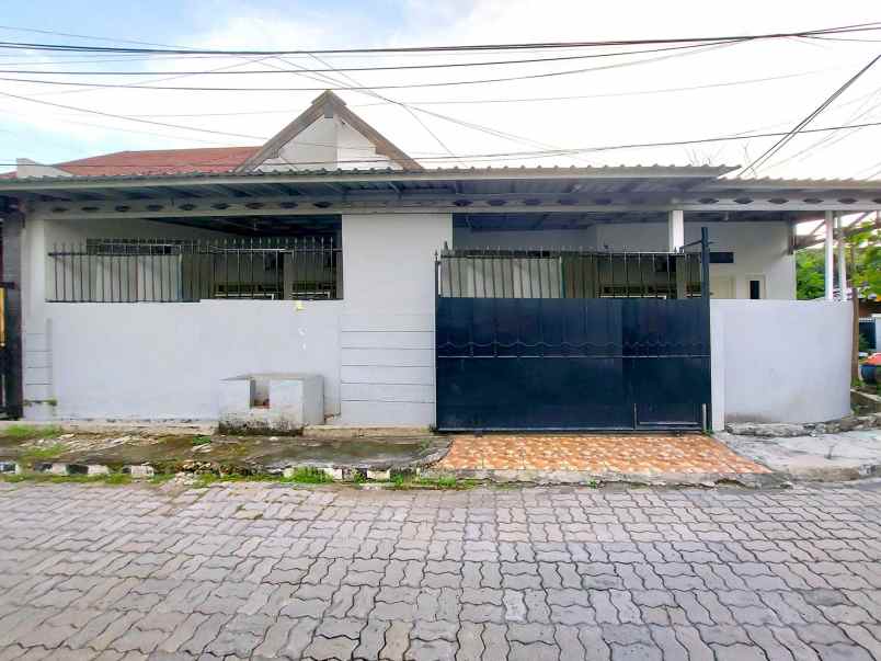 dijual rumah wiguna