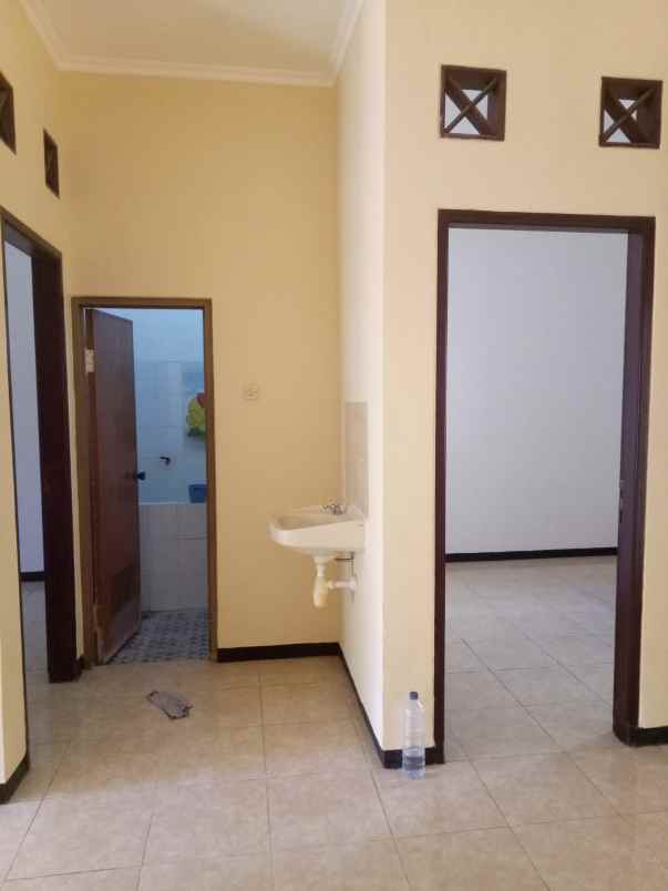 dijual rumah wiguna