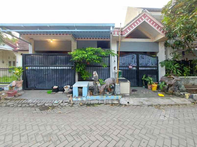 dijual rumah wiguna
