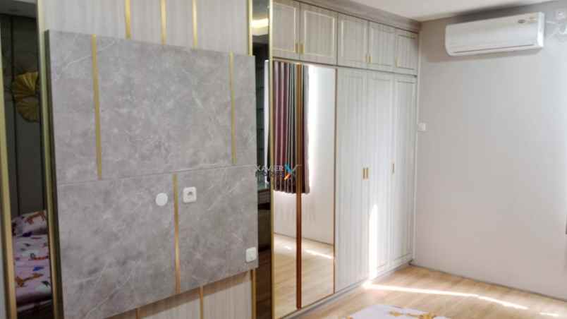 disewakan rumah queensland grand pakuwon new minimalis