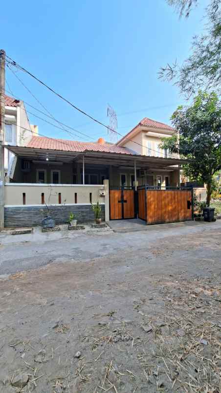 rumah 1 5lt hdp timur semi furnished cluster di cinere