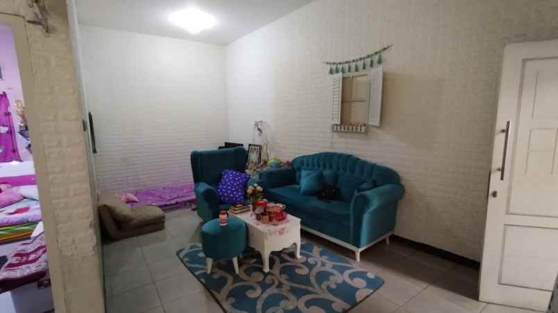 rumah 2 lantai luas 120m type 2kt harapan jaya bekasi