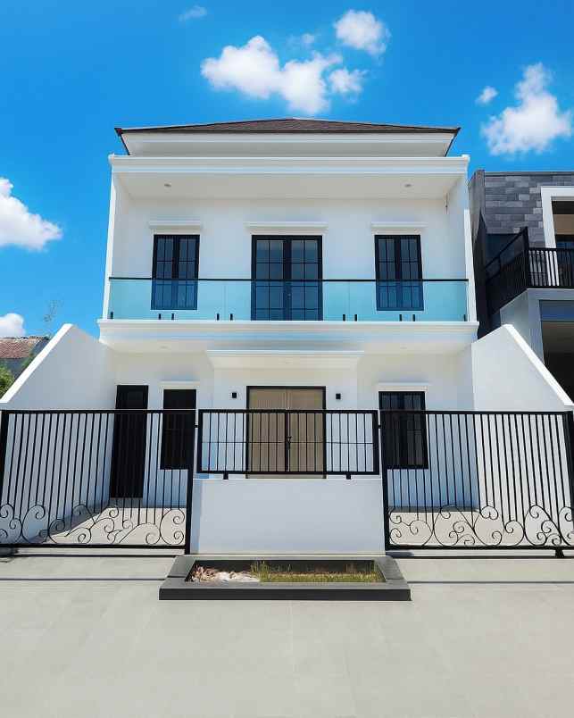 rumah babatan pantai new minimalis carport 2