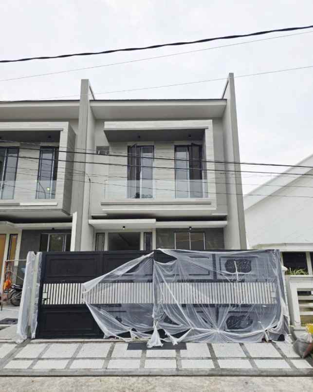 rumah dharmahusada indah new minimalis