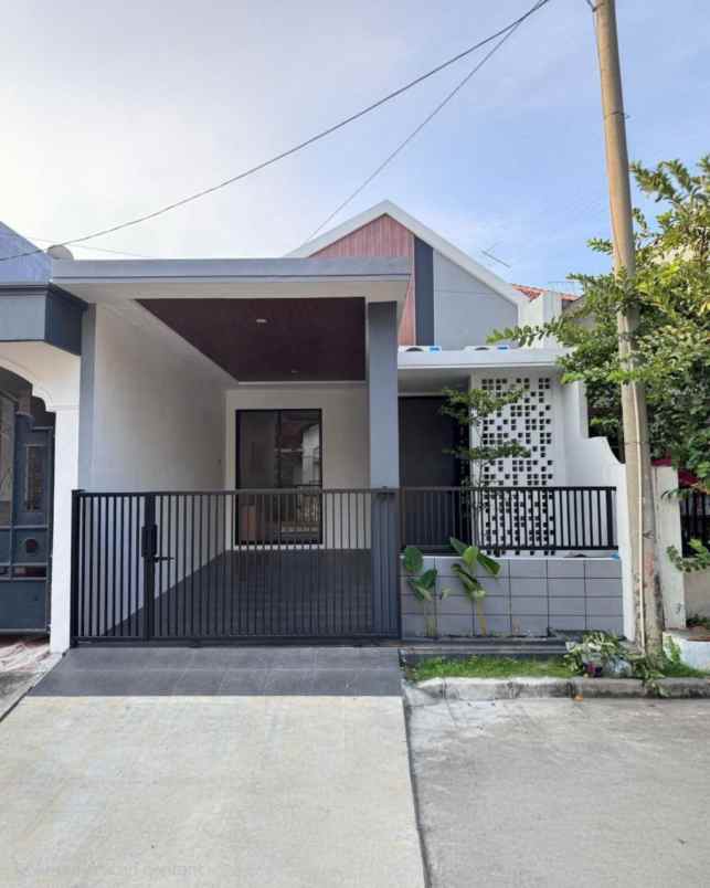 rumah griya asri pakuwon city strategis furnish