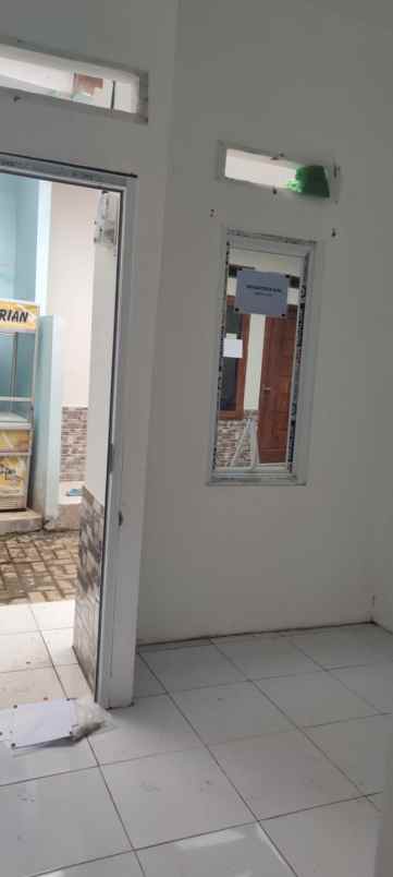 rumah kontrakan 8 pintu